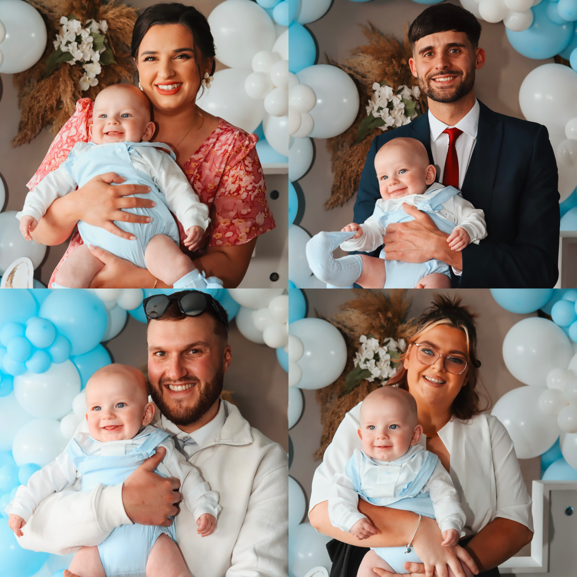 A family celebrating together with baby boy amid soft blue and white balloons